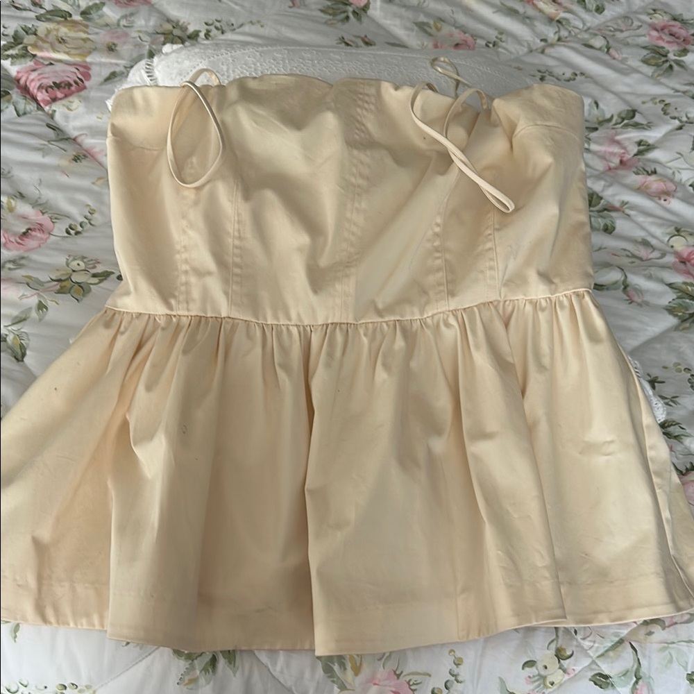 Cream Strapless Peplum Top